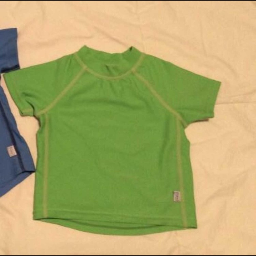 3/25$. Rash guard/swim shirt (green).  3-6m